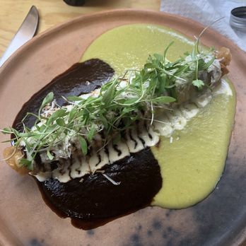 Comal Oculto - Red and green chicken taquito - loved the green sauce,mild but plenty of flavor. - México, D.F., DIF Comal Oculto - Red and green chicken taquito - loved the green sauce,mild but plenty of flavor. - México, D.F., DIF
