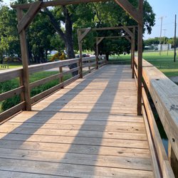 Stephenville City Park - Bridge leading to one of two very large playgrounds