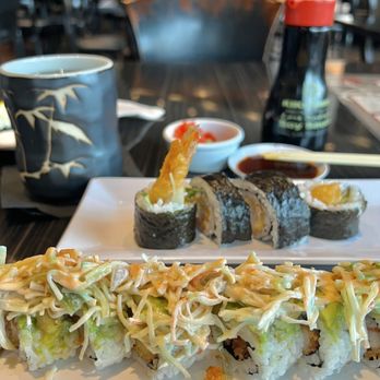 Miyako - Tiger Eye Maki upfront and Rock N' Roll Maki in the back with hot green tea - Japanese Near Me - Houston, Texas