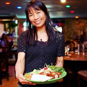 Thai E-San - Beautiful waitress serving E-San Sausage, killer!! - Thai Near Me - Phoenix, Arizona Thai E-San - Beautiful waitress serving E-San Sausage, killer!! - Thai Near Me - Phoenix, Arizona