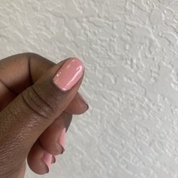L C Nails & Spa - Lumpy, poorly polished nails that are chipping.