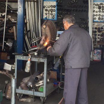 Pro Mufflers & Brakes - Gabriel cutting and welding on 1.75" bypass pipe for 997 Gundo hack - Auto Repair Near Me - Midway City, California Pro Mufflers & Brakes - Gabriel cutting and welding on 1.75" bypass pipe for 997 Gundo hack - Auto Repair Near Me - Midway City, California