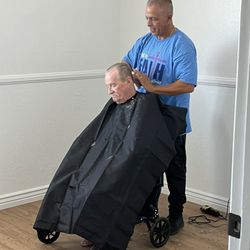 Heaven Bound - Fernando giving dad a hair cut.
