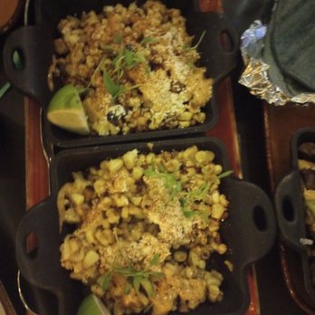 Descanso - Elote served on a hot skillet - Mexican Near Me - Costa Mesa, California Descanso - Elote served on a hot skillet - Mexican Near Me - Costa Mesa, California