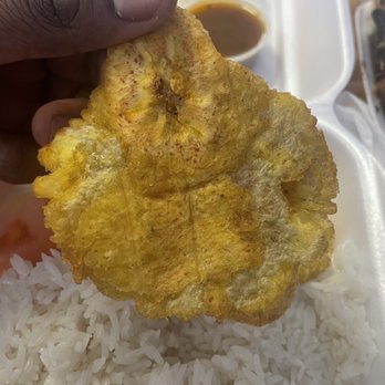 Annes Paradise - a hand holding a piece of food - Fast Food Near Me - Lauderdale Lakes, Florida Annes Paradise - a hand holding a piece of food - Fast Food Near Me - Lauderdale Lakes, Florida