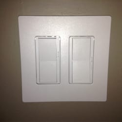 Michigan Chandelier - Screw less plates and tiny dimmers on these switches.