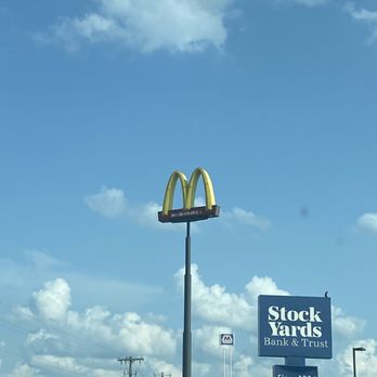 McDonald's - a mcdonald's sign in the foreground - Fast Food Near Me - Shepherdsville, Kentucky