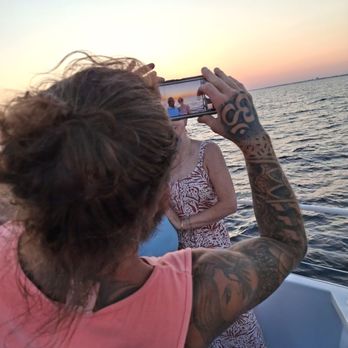 AJ's Water Adventures - Codey helping with pics - Boat Charters Near Me - Destin, Florida AJ's Water Adventures - Codey helping with pics - Boat Charters Near Me - Destin, Florida