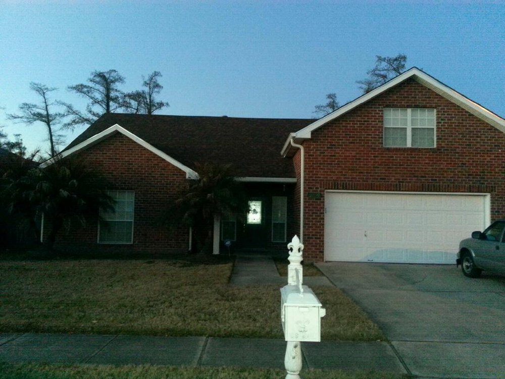 Slide of Brennan's Roofing