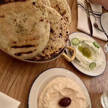Mamakas Taverna - House pita and dips - Greek Near Me - Toronto, Ontario Mamakas Taverna - House pita and dips - Greek Near Me - Toronto, Ontario