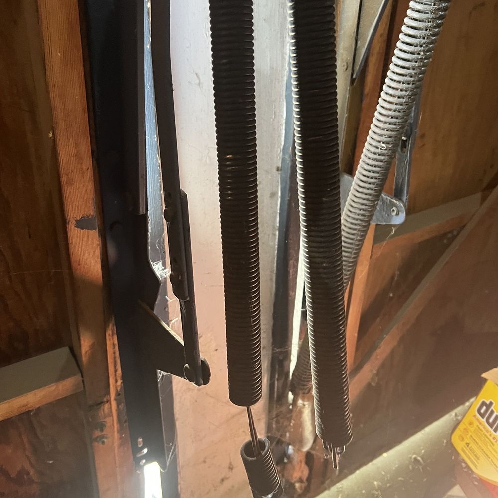 Garage Door Basics - Old snapped springs - Garage Door Services Near Me - Glendale, California Garage Door Basics - Old snapped springs - Garage Door Services Near Me - Glendale, California