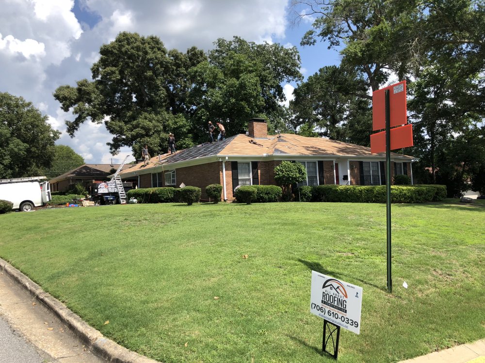 Slide of All About Roofing & Construction