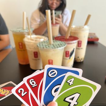 Gong Cha - a person holding a deck of playing cards - Bubble Tea Near Me - Houston, Texas Gong Cha - a person holding a deck of playing cards - Bubble Tea Near Me - Houston, Texas