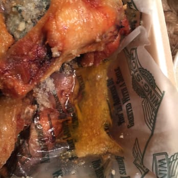 Wingstop - A pool of frying oil, careless service on a slow night. - Chicken Wings Near Me - Vernon, Connecticut