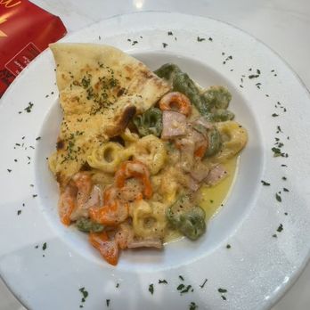 McDonald's - Tortellini pasta with Alfredo Sauce and Canadian Bacon - Burgers Near Me - Orlando, Florida McDonald's - Tortellini pasta with Alfredo Sauce and Canadian Bacon - Burgers Near Me - Orlando, Florida