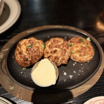 Little West Tavern - Cheddar Scallion Drop Biscuits - LWT Signature - Bars Near Me - Columbus, Ohio Little West Tavern - Cheddar Scallion Drop Biscuits - LWT Signature - Bars Near Me - Columbus, Ohio