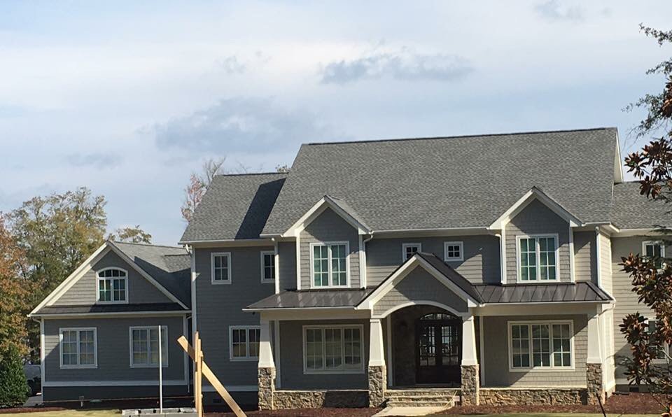 Slide of Patch Adams Roofing