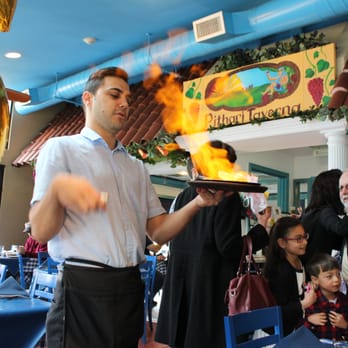 Pithari Taverna - This is when they bring out the Saganaki (sorry not appealing picture for the server) - Greek Near Me - Highland Park, New Jersey Pithari Taverna - This is when they bring out the Saganaki (sorry not appealing picture for the server) - Greek Near Me - Highland Park, New Jersey