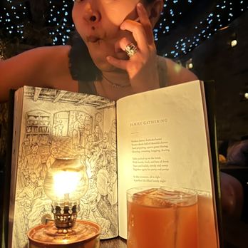 Here Nor There - Story book menu inside venue - Cocktail Bars Near Me - Austin, Texas Here Nor There - Story book menu inside venue - Cocktail Bars Near Me - Austin, Texas