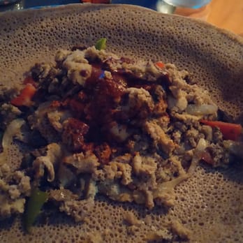 Star Coffee Restaurant - Beef Tibs Firfir: cubed beef, onion pieces, red pepper chunks, pieces of jalapeño & seeds, mixed with injera pieces and awaze spicy sauce. - Ethiopian Near Me - Seatac, Washington Star Coffee Restaurant - Beef Tibs Firfir: cubed beef, onion pieces, red pepper chunks, pieces of jalapeño & seeds, mixed with injera pieces and awaze spicy sauce. - Ethiopian Near Me - Seatac, Washington