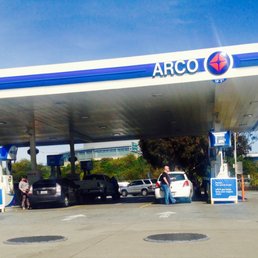 Fill up stations, facing north, CA-92 in background, Delaware Ave to the right.