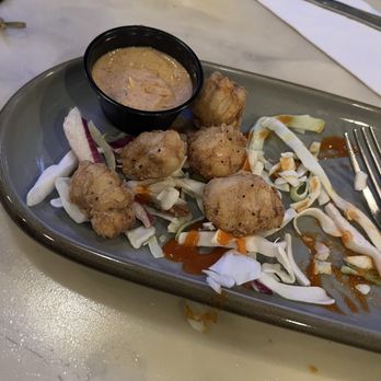 AJs Bar and Grill - Partially eaten softshell crab bites. - Bars Near Me - Cape Charles, Virginia
