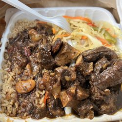 Small oxtail with cabbage. I asked for plantains and they gave me cabbage. The food is a little spicy
