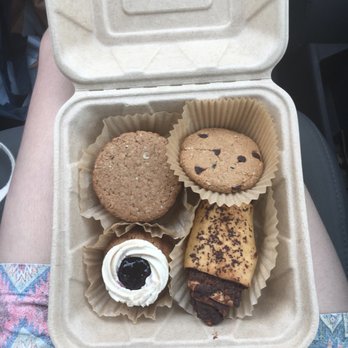 Cookie Conscious Bakery - a person's hand holding a takeout box - Bakeries Near Me - Eugene, Oregon