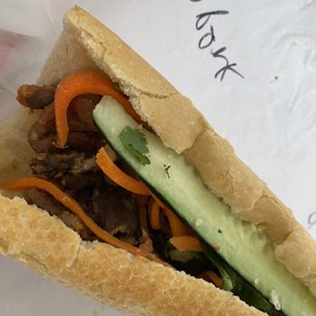 Cali Baguette Express - 1/2 of the BBQ pork banh mi - Vietnamese Near Me - San Diego, California Cali Baguette Express - 1/2 of the BBQ pork banh mi - Vietnamese Near Me - San Diego, California