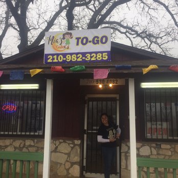 Mia’s Cafe - a woman standing in front of a restaurant - Mexican Near Me - Elmendorf, Texas