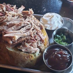 Massive loaded potato!!  It was destroyed by my husband. Nothing left but the skin.  He loved it!