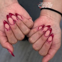 Day Nail Bar - Classic Red Swirl Nails Art at Day Nail Bar. CALL(408)591-1166 4750 Almaden Expy, San Jose, CA, 95118. Follow Us: IG @day_nailbar