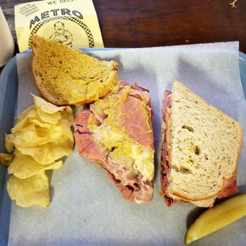 Metro Deli - Bill Lewis of Fort Lauderdale enjoying the Paatrami and Corn Beef sandwich at Metro Deli of Tallahassee, Florida. - Delis Near Me - Tallahassee, Florida