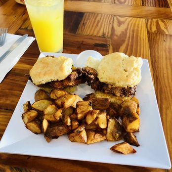 The Blue Hen Cafe - Fried chicken biscuit with home fries - Southern Near Me - Saint Augustine, Florida
