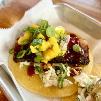 Avo Taco - Piggy Smalls (pork belly, Korean BBQ sauce, slaw, mango salsa, scallions) - Cocktail Bars Near Me - New Hyde Park, New York Avo Taco - Piggy Smalls (pork belly, Korean BBQ sauce, slaw, mango salsa, scallions) - Cocktail Bars Near Me - New Hyde Park, New York