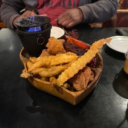 Pu Pu Tray - fire keeps it warm and you can cook the meat more with it if desired Pu Pu Tray - fire keeps it warm and you can cook the meat more with it if desired