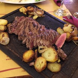 Tagliata di manzo con contorno di patate saltate