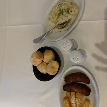 Fogo de Chão - fried bananas delish, Portuguese cheese bread and Fried polenta OK. mashed potatoes are an 11/10. Fried cheese and honey - yum! - Brazilian Near Me - Naperville, Illinois