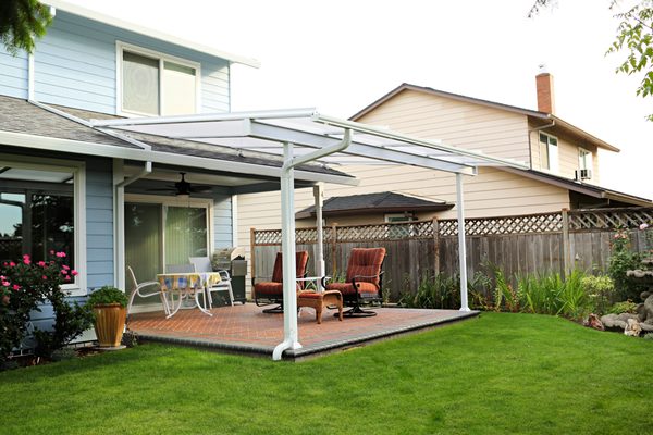 Shed Style Patio Covers - A shed style has a single sloping roof away from the house. Make your deck/patio usable all year! Imagine hosting BBQ’s and events on your patio  even when it is raining… or staying cool under a natural light patio cover that blocks the hot sun while letting in the light.