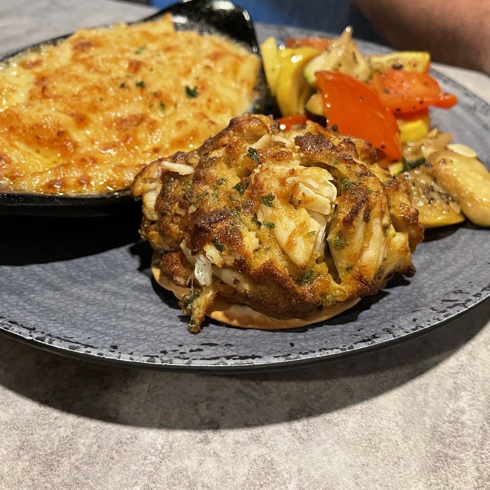 Casa Mia’s Surfside - 8oz crab cake dinner with Mac n cheese and chefs veggies - Italian Near Me - Surfside Beach, South Carolina Casa Mia’s Surfside - 8oz crab cake dinner with Mac n cheese and chefs veggies - Italian Near Me - Surfside Beach, South Carolina