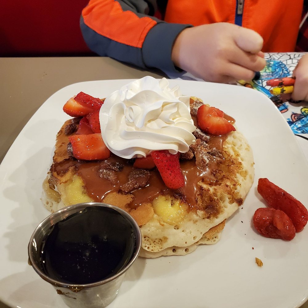Toast - Fat Elvis Pancakes...with candied bacon, bananas, peanut butter sauce, strawberries and more. - Breakfast & Brunch Near Me - Birmingham, Michigan Toast - Fat Elvis Pancakes...with candied bacon, bananas, peanut butter sauce, strawberries and more. - Breakfast & Brunch Near Me - Birmingham, Michigan