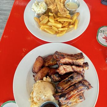 Lee’s Roadside Bar & Grill - Ribs with potato salad and fried plantains Fish and chips with coleslaw - Seafood Near Me - Sint Maarten, New Hampshire