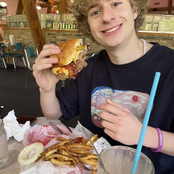 Cheeburger Cheeburger - Eating a cheeburger! - Burgers Near Me - Sanibel Island, Florida Cheeburger Cheeburger - Eating a cheeburger! - Burgers Near Me - Sanibel Island, Florida