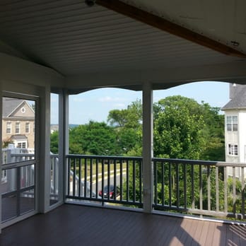 Classic Screened Porch And Deck With Azek Silver Oak Flooring