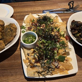 Yard House - 10 Crispy Traditional Wings, Poke Nachos, Crispy Brussels Sprouts - New American Near Me - Tucson, Arizona Yard House - 10 Crispy Traditional Wings, Poke Nachos, Crispy Brussels Sprouts - New American Near Me - Tucson, Arizona