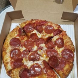Small pepperoni with 4 large slices. I devoured the entire thing and am so full lol
