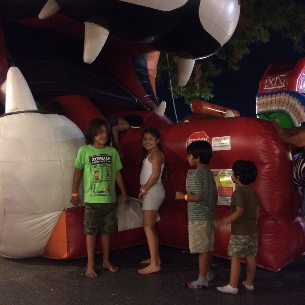 Jump With Chris - Having a great time  we come every year and every year it's great the staff is so friendly and the price is just right for all day - Bounce House Rentals Near Me