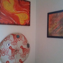 JOANN Fabric and Crafts - Paul helps me find the perfect fabric every time! Orange octopus fabric used for a decorative Adventure Pin board.