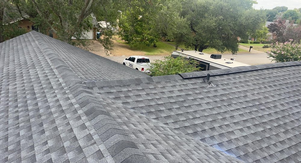 Slide of Top Dawg Roofing