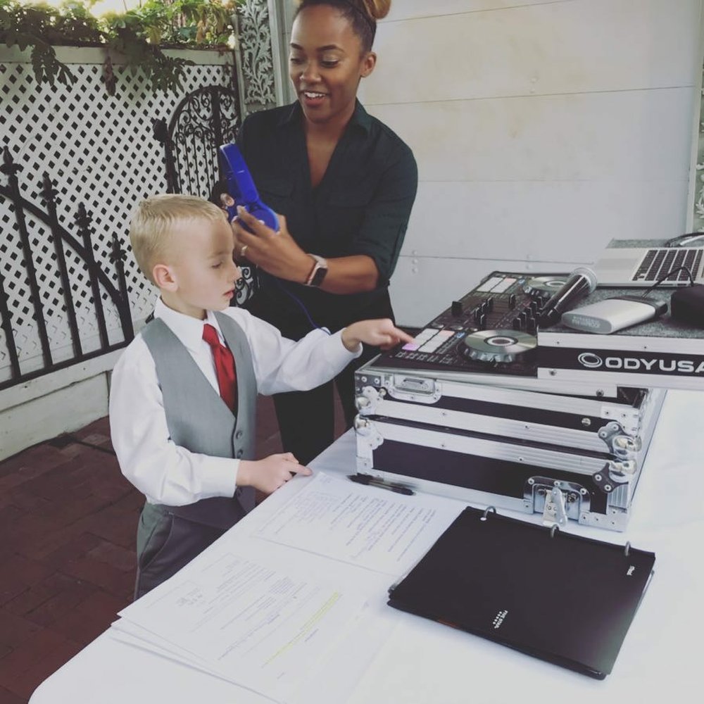 VOX DJs - DJ Dani showing our ring bearer the ropes - Photo Booth Rentals Near Me - Costa Mesa, California VOX DJs - DJ Dani showing our ring bearer the ropes - Photo Booth Rentals Near Me - Costa Mesa, California